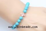 CGB9352 8mm, 10mm blue howlite & cross hematite power beads bracelets