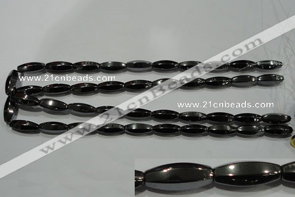 CHE141 15.5 inches 8*20mm faceted rice hematite beads wholesale