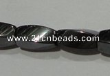 CMH152 15.5 inches 5*11mm twisted rice magnetic hematite beads