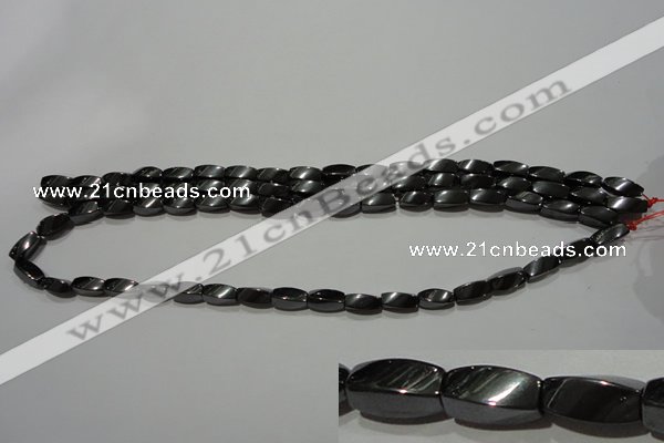 CMH152 15.5 inches 5*11mm twisted rice magnetic hematite beads