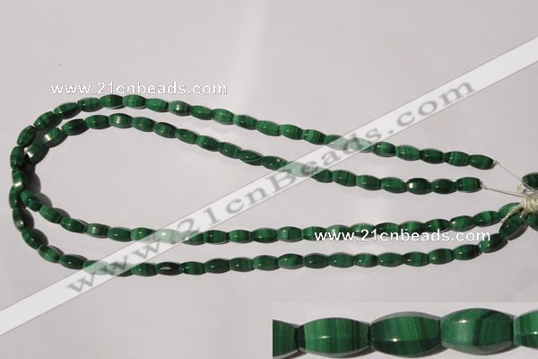 CMN223 15.5 inches 5*9mm faceted rice natural malachite beads