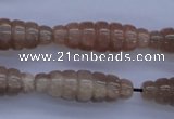 CMS135 15.5 inches 10*30mm carved rice natural moonstone beads