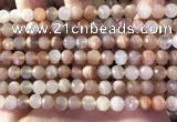 CMS1891 15.5 inches 6.5mm faceted round rainbow moonstone beads