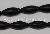 CNE15 15.5 inches 9*20mm carved rice black stone needle beads wholesale