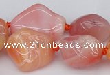 CNG1080 15.5 inches 12*20mm - 14*35mm nuggets red botswana agate beads