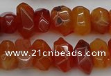 CNG1170 15.5 inches 8*14mm - 10*18mm faceted nuggets carnelian beads