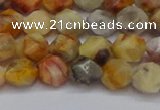 CNG6222 15.5 inches 6mm faceted nuggets yellow crazy lace agate beads