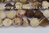 CNG6245 15.5 inches 6mm faceted nuggets zebra jasper beads