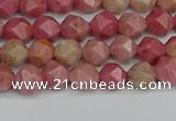 CNG7420 15.5 inches 6mm faceted nuggets rhodochrosite beads