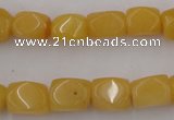 CNG807 15.5 inches 9*12mm faceted nuggets yellow jade beads