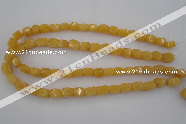 CNG807 15.5 inches 9*12mm faceted nuggets yellow jade beads