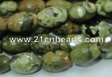 CRH68 15.5 inches 10*15mm faceted rice rhyolite beads wholesale