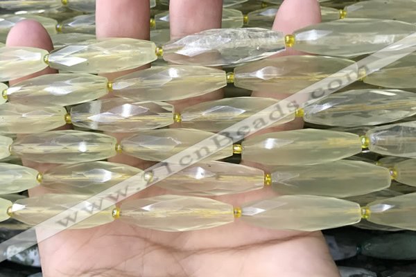 CRI132 15.5 inches 10*30mm faceted rice lemon quartz beads