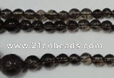 CRO743 15.5 inches 6mm – 14mm faceted round smoky quartz beads