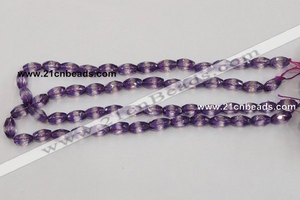 CSA25 15.5 inches 7*12mm faceted rice synthetic amethyst beads