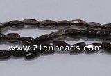 CSQ112 4*7mm faceted rice grade AA natural smoky quartz beads