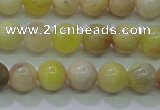 CSS600 15.5 inches 4mm round yellow sunstone gemstone beads