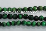 CTE1011 15.5 inches 6mm faceted round dyed green tiger eye beads