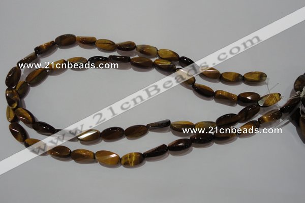 CTE1097 15.5 inches 8*15mm twisted & faceted oval yellow tiger eye beads