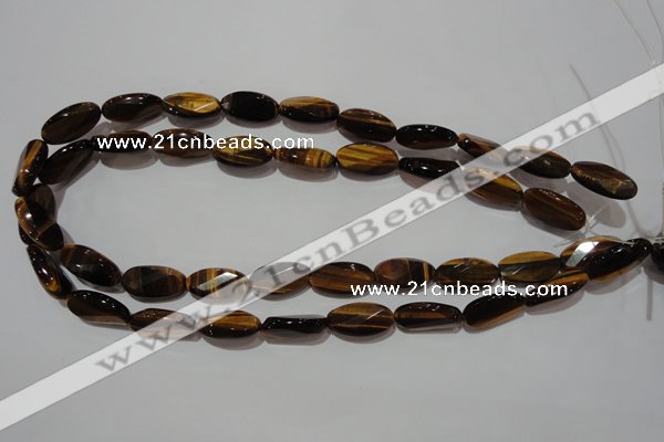 CTE1098 15.5 inches 10*20mm twisted & faceted oval yellow tiger eye beads