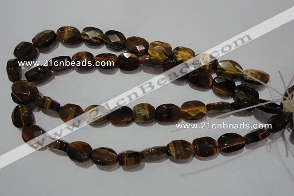 CTE1110 15.5 inches 13*17mm faceted freeform yellow tiger eye beads