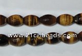 CTE206 15.5 inches 6*8mm faceted rice yellow tiger eye beads