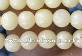 CTG1596 15.5 inches 4mm round yellow jade beads wholesale