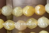 CTG2517 15.5 inches 4mm faceted round yellow jade beads