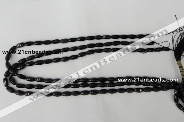 CTO116 15.5 inches 5*10mm faceted rice black tourmaline beads