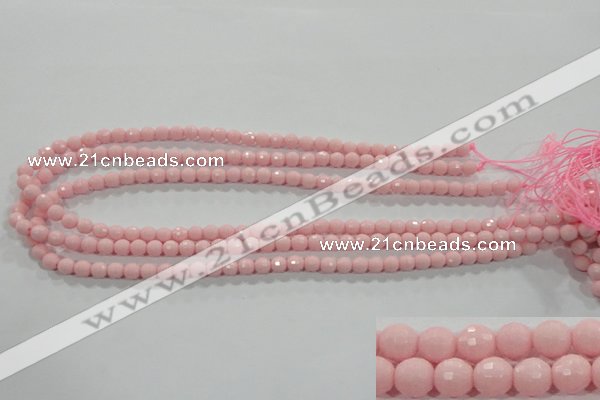 CTU1511 15.5 inches 4mm faceted round synthetic turquoise beads