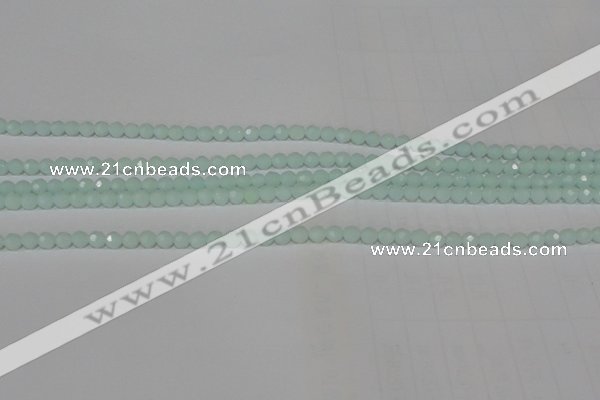 CTU2571 15.5 inches 4mm faceted round synthetic turquoise beads
