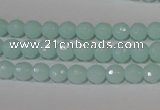 CTU2572 15.5 inches 6mm faceted round synthetic turquoise beads