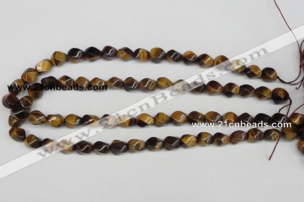 CTW151 15.5 inches 8*11mm twisted rice yellow tiger eye beads