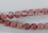 CWF01 15.5 inches 6mm faceted round pink wooden fossil jasper beads