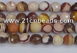 CZJ278 15.5 inches 4mm faceted round zebra jasper beads