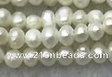 FWP05 14.5 inches 2mm - 2.5mm potato white freshwater pearl strands