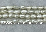 FWP285 15 inches 9mm - 10mm baroque white freshwater pearl strands