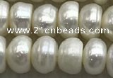 FWP322 15 inches 6mm - 7mm button white freshwater pearl strands