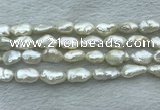 FWP353 15 inches 9mm - 10mm baroque white freshwater pearl strands